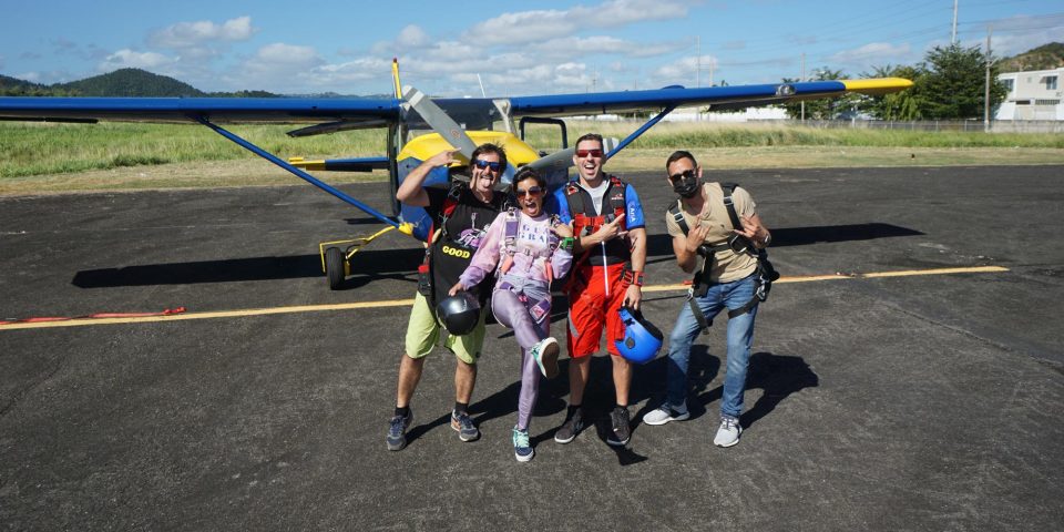Experienced skydivers making silly faces in front of the La Zona Puerto Rico Skydiving aircraft
